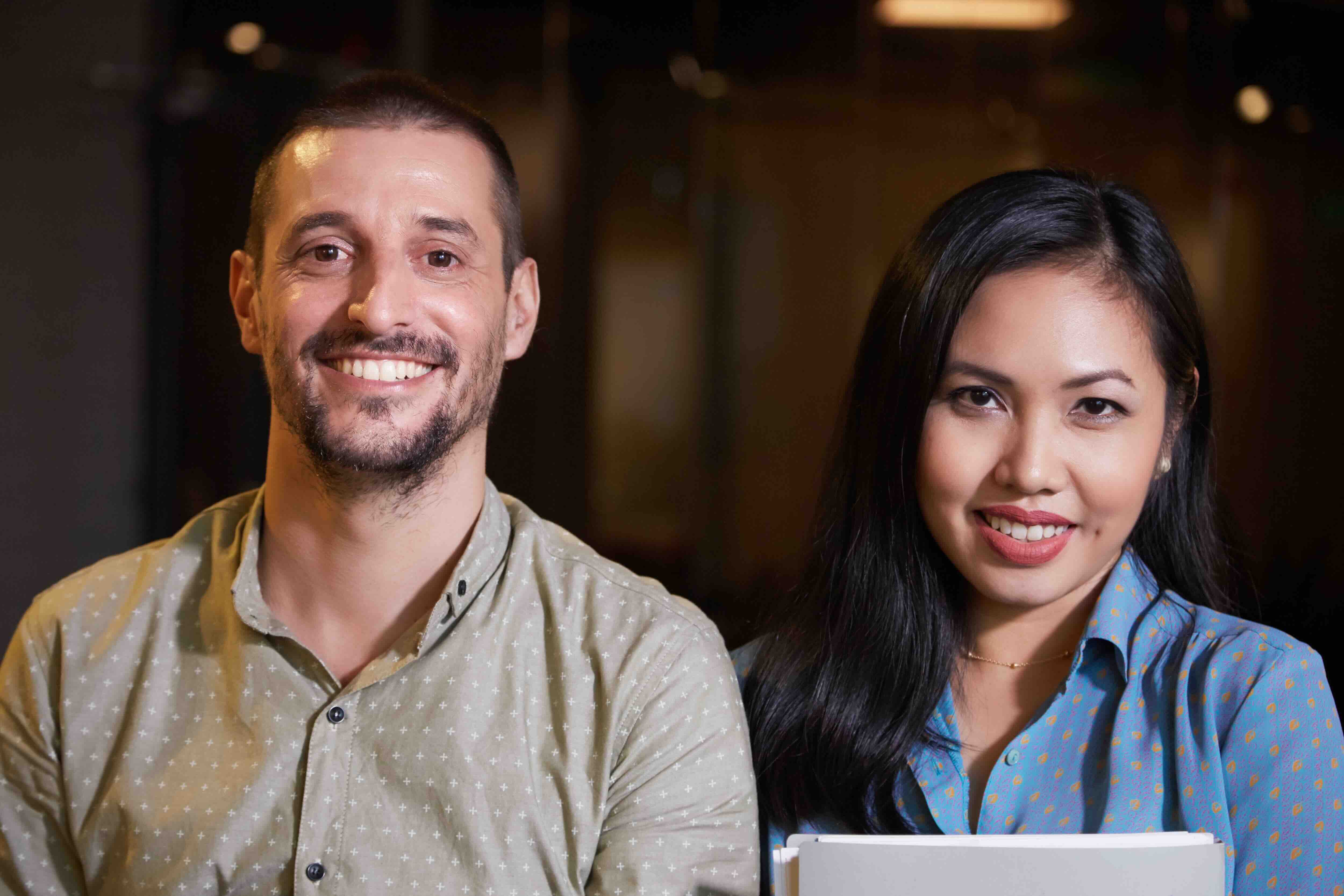 Portrait of cheerful successful multi-ethnic business team